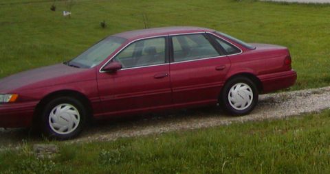 1995 Ford Taurus - This is a crop from a picture I was taking that just happened to have the Bull in it