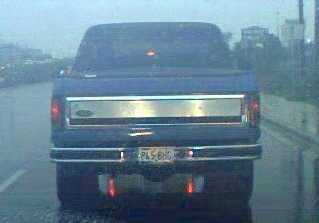 1984 Ford Bronco - Rear view, new paint and Skyler soft top