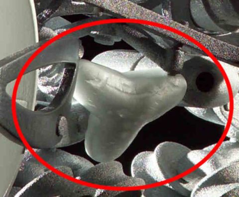 1979 Ford Bronco - A close-up view of an engine part, with a red circle drawn around a specific component.