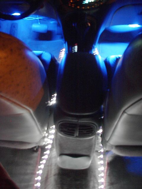 1998 Ford Taurus - here is a pic of my neon and other stuff from the back seat.