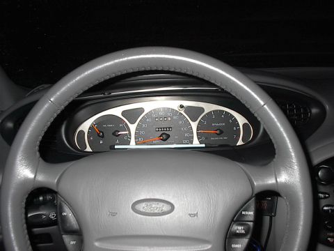 1998 Ford Taurus - here is my guage surround that i painted silver.