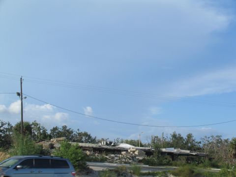 1995 Ford C-350 (Centurion Conversions) - Scene of destruction with a minivan in the foreground.