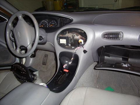 1998 Ford Taurus - this is when i started to install my new CD Changer. It's a JVC Rf Modulated 12 disc changer. I was originally planning on mounting it in t…