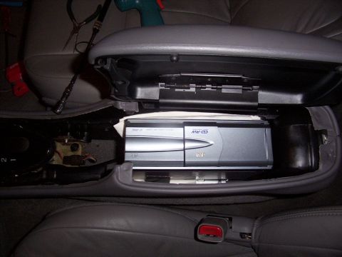 1998 Ford Taurus - Here, i fitted it in there and duct taped some rages to it to even it out and also, they give it a little more shock absorbancy.