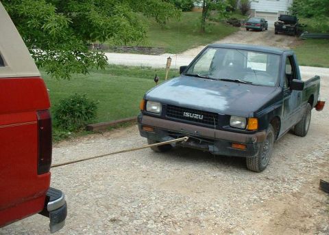 2006 Ford E350 - Towing an Isuzu.