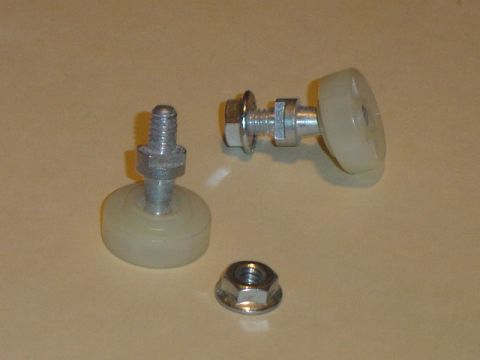 1979 Ford Bronco - Hardware for tailgate rollers is shown, including bolts, nuts, and the rollers themselves.