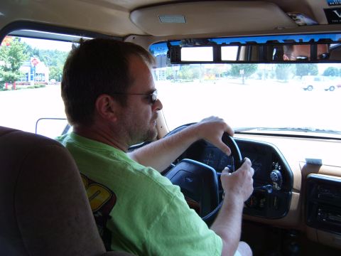 1993 Ford Bronco - Interior view of a man driving a 1992 Ford F-Series truck.