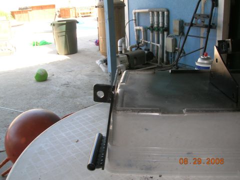 1985 Ford Bronco - Outdoor pool equipment including a pump, filter, and plumbing system.