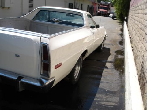 1973 Ford Ranchero - This 1973 Ford Ranchero pickup truck is seen from the rear in a narrow alleyway.