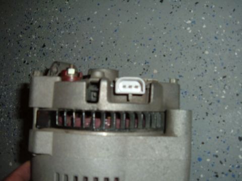 1993 Ford Bronco - Vehicle alternator part shown in detail, likely for engine repair or replacement.