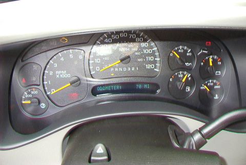 1995 Ford Bronco - The vehicle's dashboard displays various gauges and an odometer reading of 70 miles.