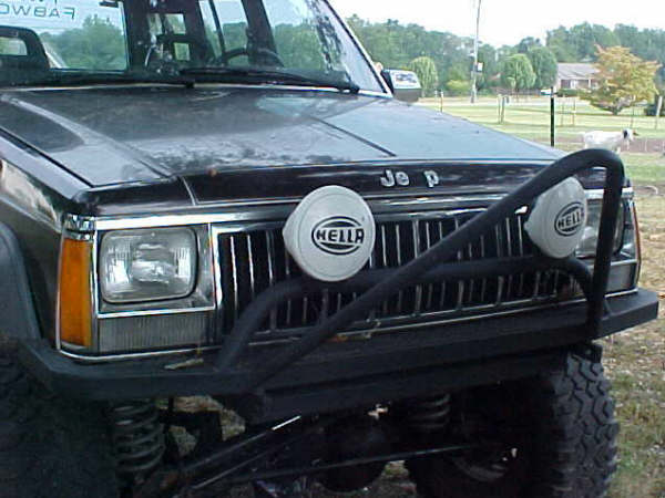 Jeep Cherokee front grille with HELLA lights and brush guard
