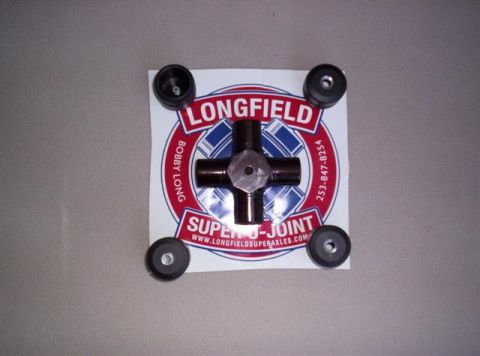 1995 Ford Bronco - A u-joint and four seals are displayed on a sticker with company information.