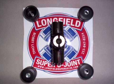 1995 Ford Bronco - U-joint and four bearing caps are displayed on a sticker for Longfield Super U-Joints, which includes a phone number and website.