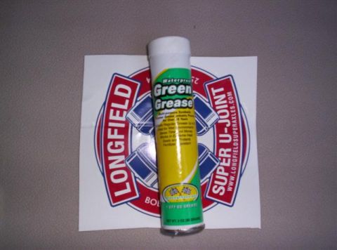 1995 Ford Bronco - A tube of Longfield Green Grease is shown with a Super U-Joint sticker in the background.