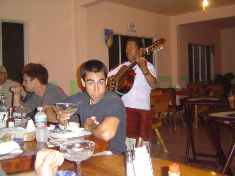 1985 Ford Ranger - A musician plays guitar for diners at a restaurant.
