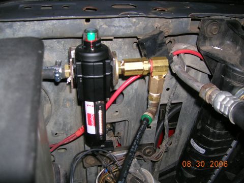 1985 Ford Bronco - oil filter and check valve...piped into existing tube.