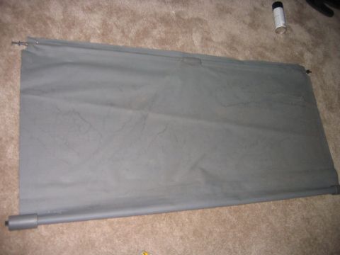 1995 Ford Bronco - This is my cover, and this is about as rolled up as it can get on its own, if you look closely you can see the safety pins holding the end…