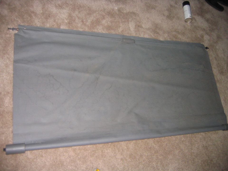 This is my cover, and this is about as rolled up as it can get on its own, if you look closely you can see the safety pins holding the end with the handle together