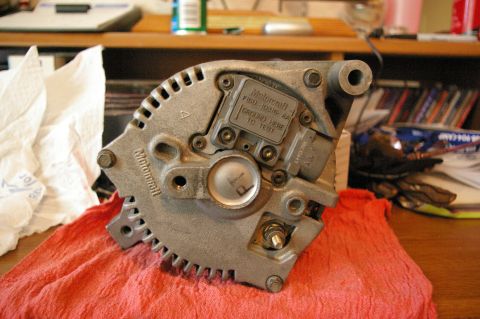 1986 Ford Bronco - Close-up of a Motorcraft alternator, likely for a Ford vehicle.