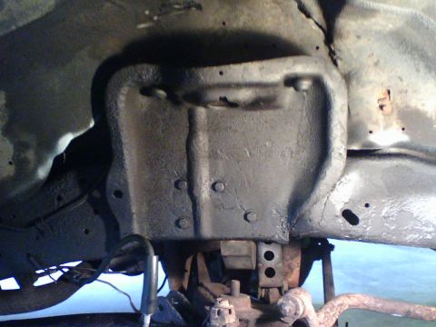 1989 Ford Bronco - donor mount ground, primed, painted and undercoated and then fastened with grade 8 7/16 bolts.