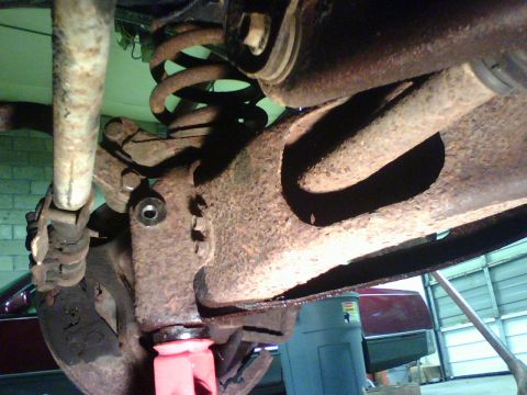 1989 Ford Bronco - I ground/ cut off the bolt and drilled a 1/2 inch hole in the frame bracket. to install the replacement.