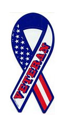 1989 Ford Bronco - A sticker a ribbon design incorporating the American flag and the word "VETERAN".