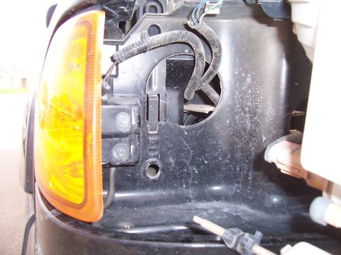 2003 Ford Ranger - The rear passenger side tail light assembly of a 2003 Ford Ranger is shown, with wiring and mounting hardware visible.