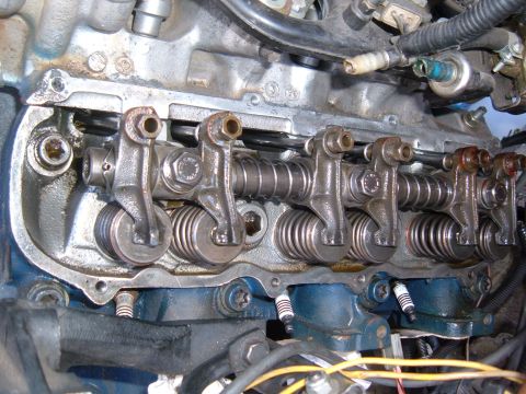 1985 Ford Bronco II - Close-up of an engine's valve train components, including rocker arms and springs.