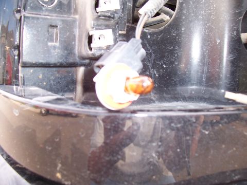 2003 Ford Ranger - This photo shows a removed tail light bulb socket, not a 2003 Ford Ranger.