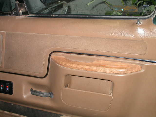 Nice, solid red oak door handle.  The original one was torn off by a passenger in a fit of terror, this one should prove to be more durable.