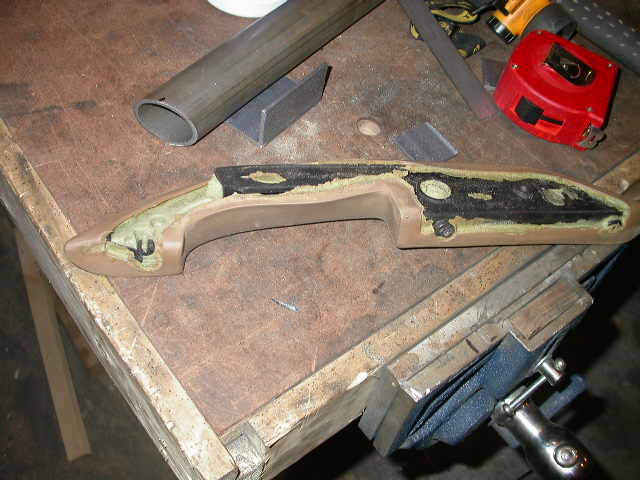 Passenger side door handle, torn off in a fit of terror.