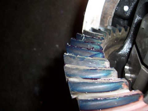 1995 Toyota Hilux - Close-up view of a gear with visible wear and blue grease applied to its teeth.