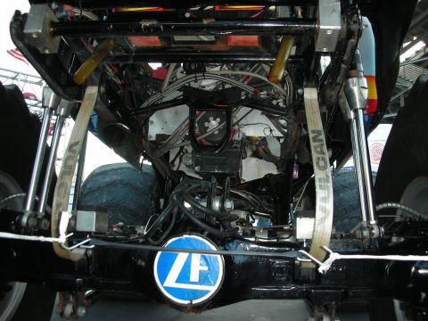 1998 Ford Crown Victoria - The complex undercarriage of a monster truck, a ZF differential and extensive wiring and suspension components.