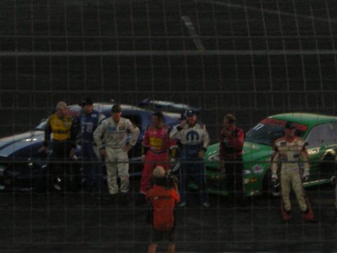 1998 Ford Crown Victoria - Drivers pose with their race cars on the track.