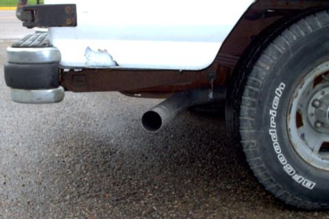 1990 Ford Bronco - 3" Mandral Bent Tailpipe from Maremont Installed. It Hangs 5.5inches Below The Body, I Can Live With That For Clearence.