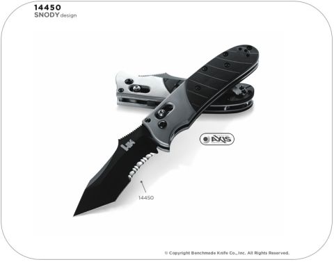 2001 Ford Crown Victoria - A folding knife with a black serrated blade and a silver handle is shown.