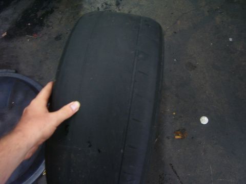 1994 Ford Probe - This is a close-up of a tire that appears to be heavily worn.
