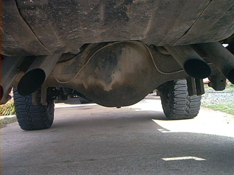 1978 Ford Bronco - Underside view of a vehicle's rear differential and dual exhaust pipes.