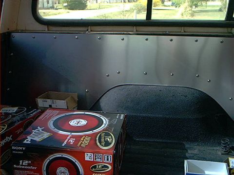 1978 Ford Bronco - The cargo area of a vehicle is prepared for new audio equipment, with two boxes of Sony Xplod 12" subwoofers ready for installation.