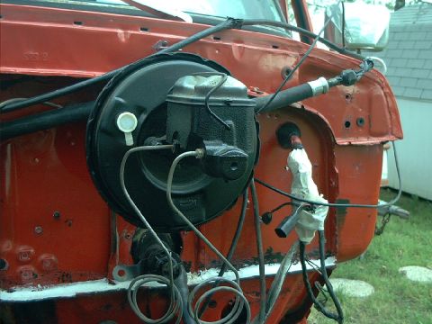1978 Ford Bronco - Close-up of the brake booster and master cylinder assembly on a 1978 Ford Bronco.