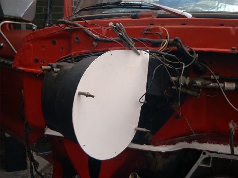 1978 Ford Bronco - Heater core assembly and firewall components of a vehicle undergoing repair or modification.