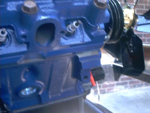 1978 Ford Bronco - Engine block detail, focus on the blue painted metal and attached pulley system.