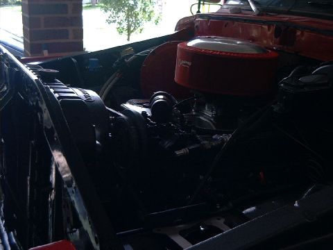 1978 Ford Bronco - Engine bay details with a prominent red air filter assembly.