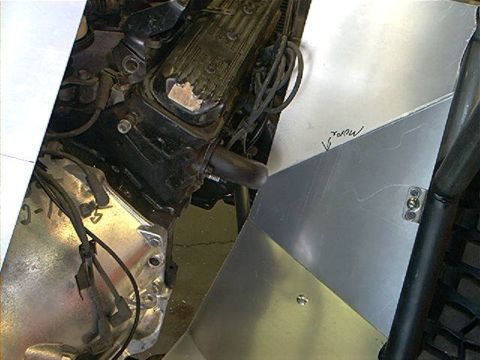 1978 Ford Bronco - Close-up of an engine bay showing mechanical components and fabricated metal panels.
