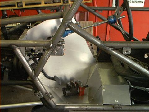1978 Ford Bronco - Interior view of a custom-built off-road vehicle, showing its roll cage and fabricated metal components.