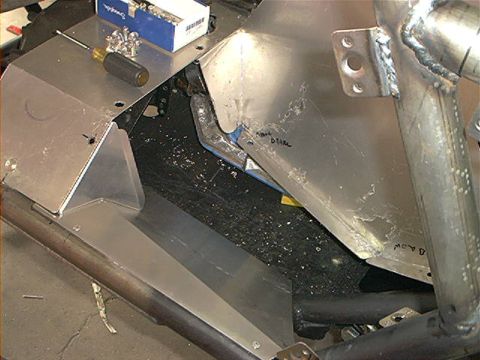 1978 Ford Bronco - Custom metal fabrication in progress, showing unfinished parts and tools.