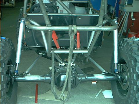 1978 Ford Bronco - The rear axle and suspension components of a heavily modified off-road vehicle are visible.