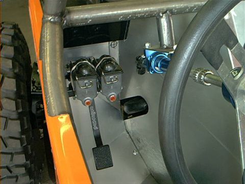 1978 Ford Bronco - Custom off-road vehicle interior with dual master cylinders and steering column components visible.