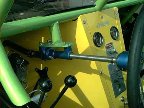 1978 Ford Bronco - Custom interior features a bright yellow dashboard, prominent roll cage, and various gauges.